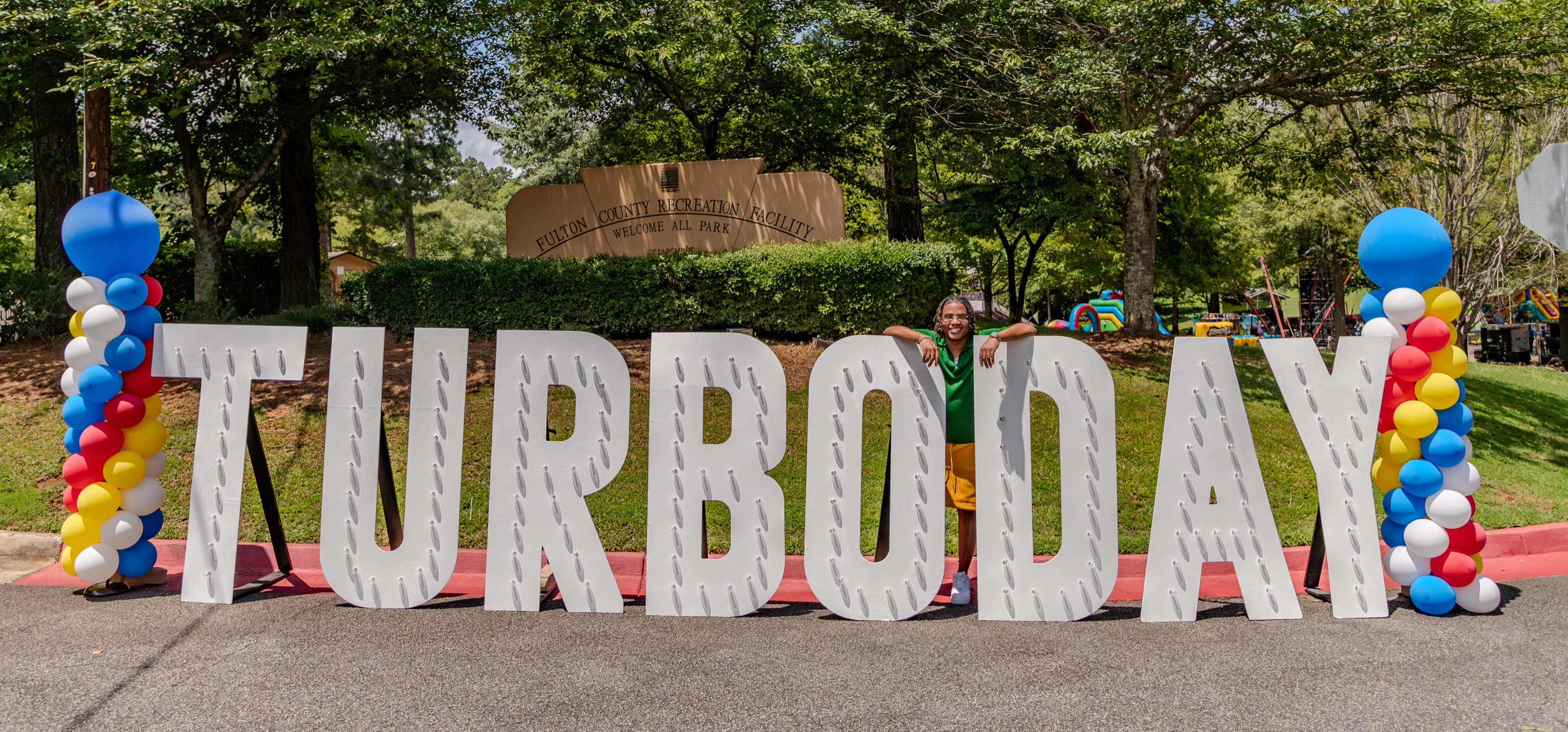 Turbo Day sign at Welcome All Park